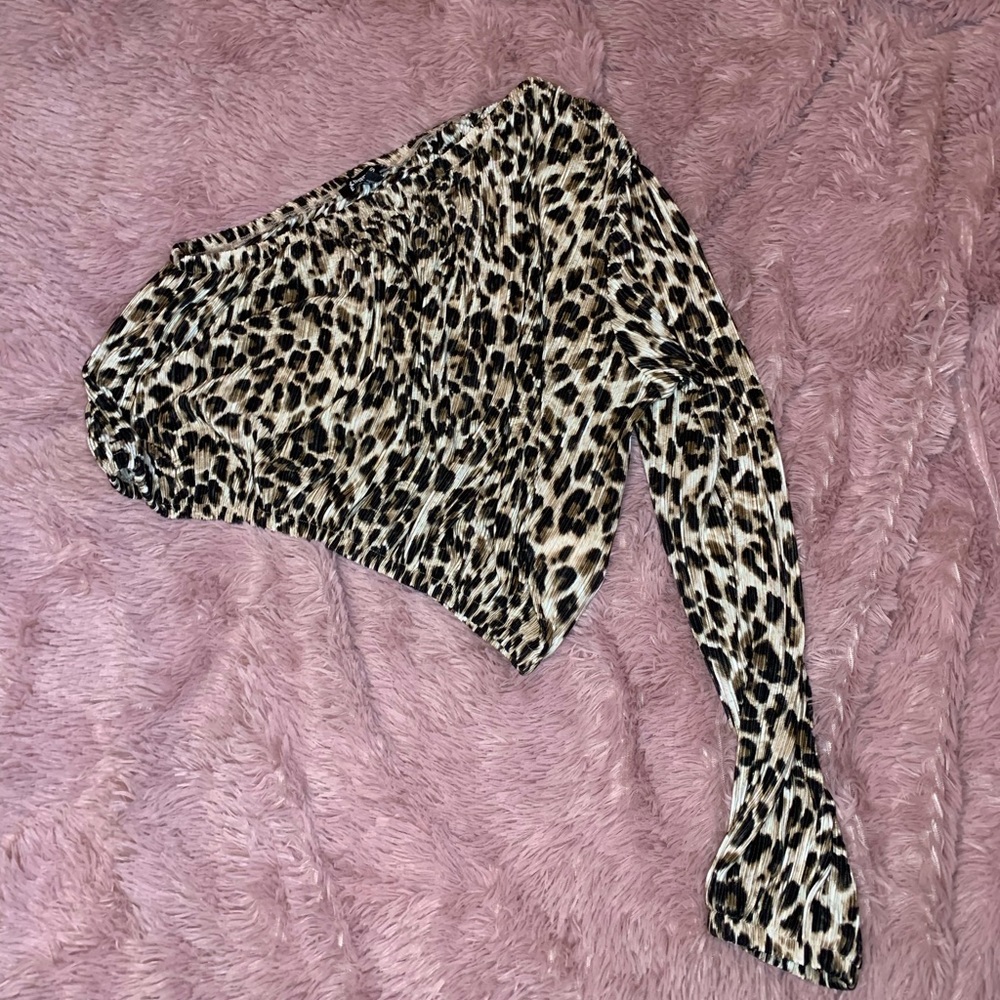 One sleeve cheetah print express top. Worn once to a Koe Wetzel concert.